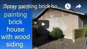 Painting exterior brick house.