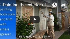 Painting exterior house with wood siding.