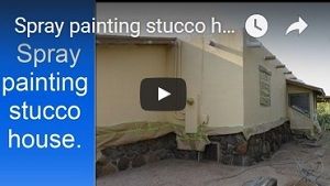  Painting exterior stucco house.